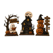 Vintage Halloween resin figurine set of 3 on white background — ghost, haunted house, pumpkin stack
