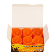 Six flameless Halloween jack-o’-lantern LED tea light candles glowing warm orange