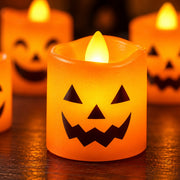 Close-up glowing Halloween jack-o’-lantern LED candle
