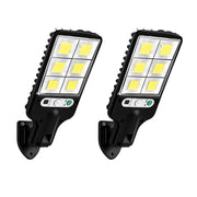2-pack solar security wall lights — true-proportion studio shot